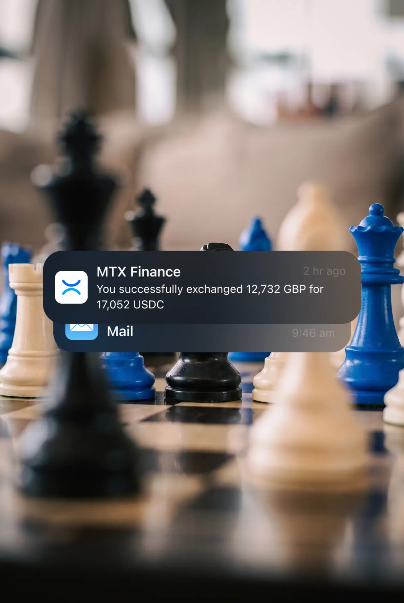 MTX Finance exchange notification over blue and cream chess pieces